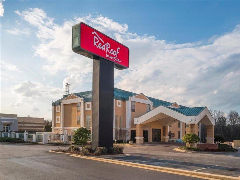 纽南红顶套房酒店 外观 照片